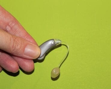 hand-hearing-aid-ada-compliance
